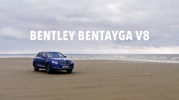 Bentley Bentayga driving on sand